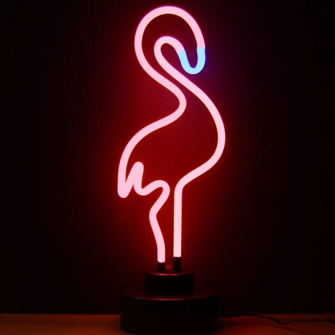 Flamingo Neon Sculpture with hand-blown neon tubing on a black display base