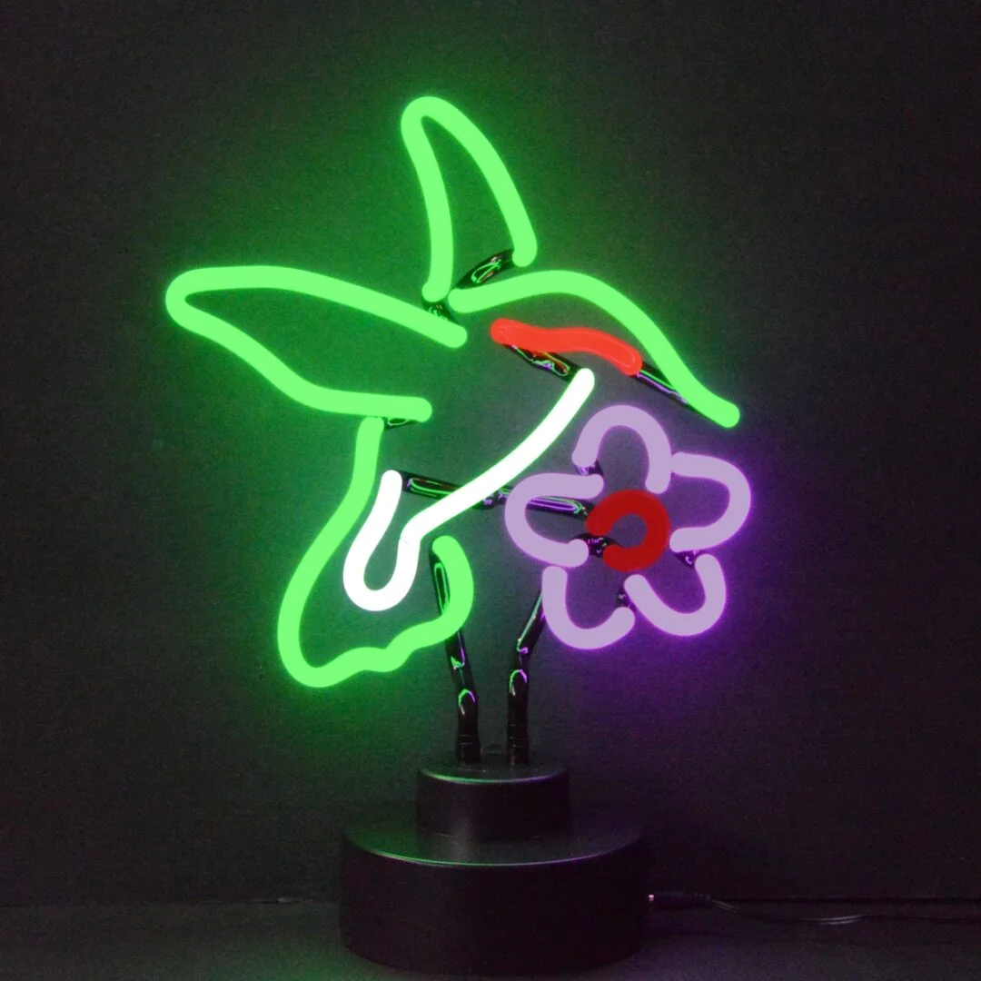 Hummingbird and flower neon sculpture on a black display base