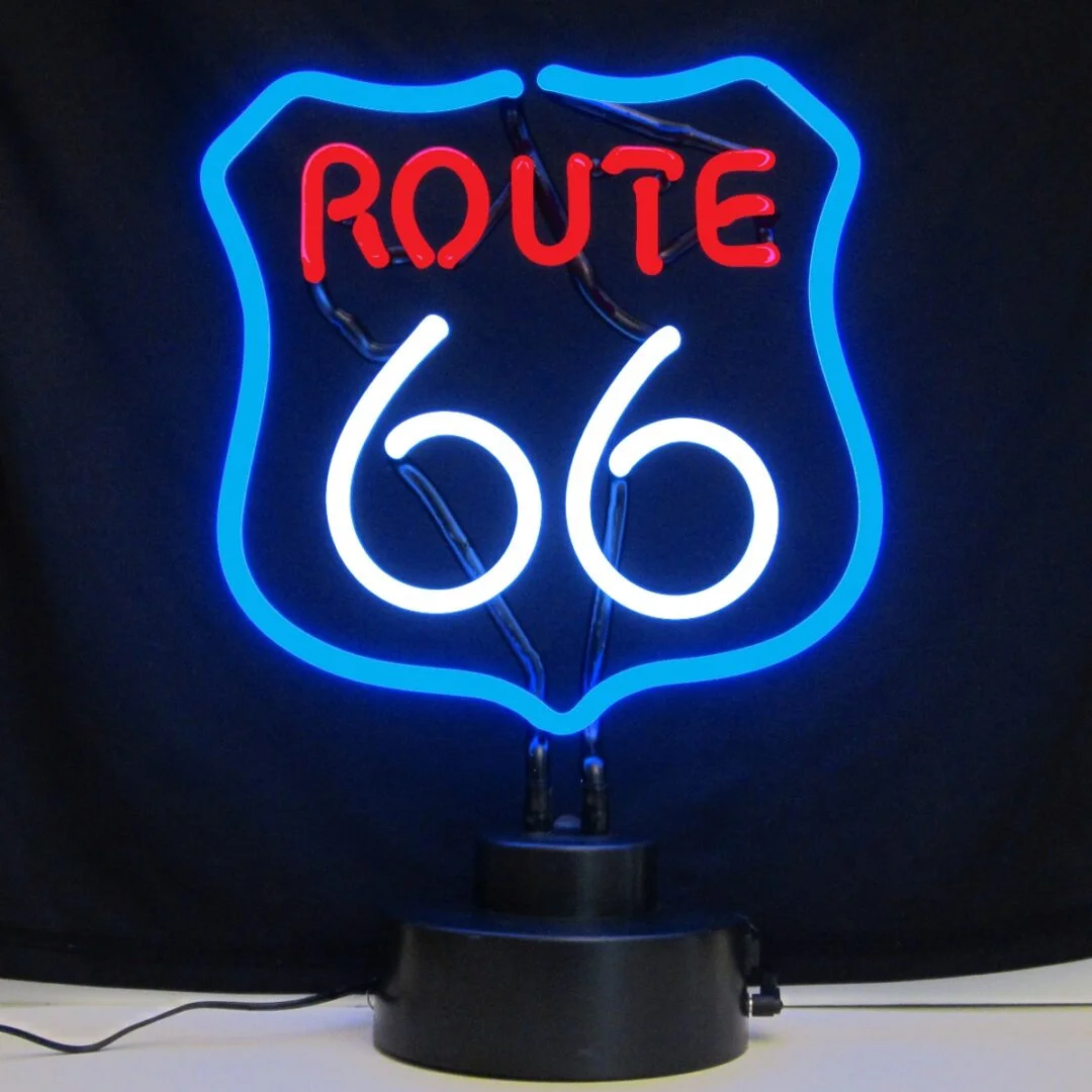 Route 66 neon sculpture glowing red white and blue